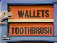 The last two prizes are wallets and a toothbrush.