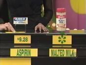 She says the Carnation malted milk is less expensive than the Bayer women's aspirin.