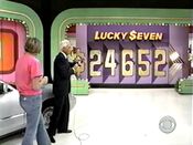 She says 5 and has $2 left. She wins the year 2000 Mercury Grand Marquis GS!