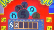 He says the second number is a 3 but is incorrect. The car is now $1.00.