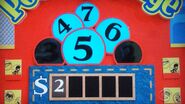 He says the second number is a 3 but is incorrect. The car is now 50¢.