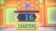 She bids $25 on the 8pc slate coaster set. A difference of $9. She picks card #16.