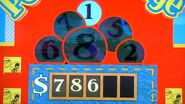 She says the fourth number in the price of the Cadillac is a 2 but is incorrect.