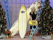 She picks the Infinity surfboards. But, do they have the same price as the Miller Import cleo lamp.