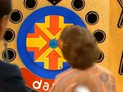 Her last throw went just below, and unfortunately, she has lost.