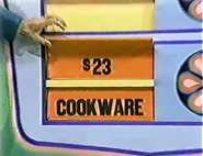She keeps the cookware. The frame is $23 and goes into the give column.