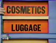 The next two prizes are cosmetics and luggage.