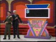 Buy or Sell board with black neon display.