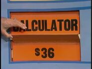 She keeps the calculator. The slacks are $36 and they go into the give column.