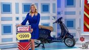 She picks the Vespa Primavera 50 motorscooter.