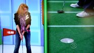 The contestant has made her putt.