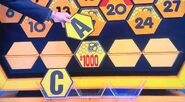It's an A. $1,000 is still up for grabs, but the contestant decides to go for the car.