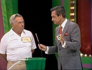 Wayne's seventh draw is a 8. He thinks it's the second number but is incorrect.