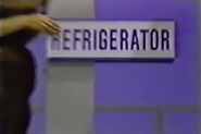 Next, she picks the refrigerator which is...