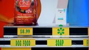 The price of the Purina One dog food is $8.99. Is the soap more or less than the dog food. She says it is less. Is she right?