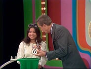 Mayumi's sixth draw is a 0. She thinks it's the third number.