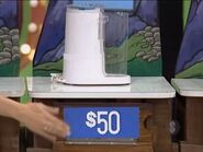 Jeanine bids $50 on the Norelco water purifier and is exactly right!