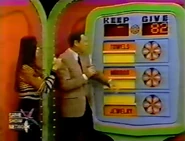 ...$82. She keeps the jewelry, mirror, and towels no matter what happens. But if they total $82 or more, she wins the trailer and canoe.