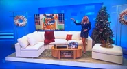 Laura & Daniel are playing for a 7th Avenue modular sofa, an oak coffee table, and an 86" 4K smart TV.