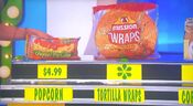 She says the Mission sun-dried tomato basil tortilla wraps are less expensive than the Jollytime organic popcorn.
