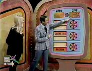 She keeps the vacuum, cosmetics, and wallets no matter what happens. But if they total $129 or more, she wins the sofa and color TV.