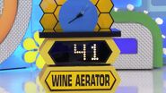 He bids $48 on the wine aerator. He picks card #1.