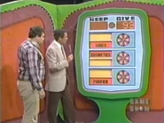 ...for a total of $93. He keeps the purifier, the cosmetics, and the shoes no matter what happens. But if they total $93 or more, he wins the bed and color TV.