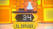 He bids $60 on the Innogear oil diffuser w/10 oils. A difference of $26. He gets no card.