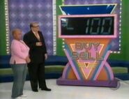 ...-$100, so if she makes $100 or more on the final deal, she will win.