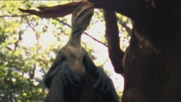 An Anurognathus roosting in a tree smelling blood