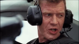 Danny commandeers a helicopter to distract the G. Rex.