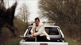 Danny fending off a Terror Bird with a pipe.