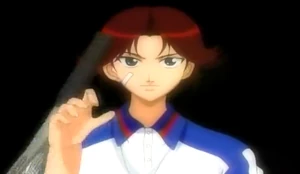 Eiji's determind face as he rolls his racket.