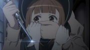 Prefect grabs Beatrice from behind