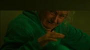 Liz watches on as Cherry get beaten in the showers