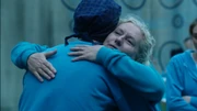 Maxine is hugged by Liz as she is fare-welled by the Hblock ladies