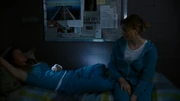 Allie tries to comfort a despondent Kaz after.