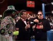 Randy Savage, Vince McMahon, and Rob Bartlett.