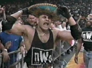 Konnan wearing a sombrero.