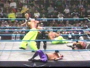 Shane Helms performing a move in the ring.