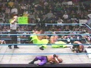 Shane Helms performing a move in the ring.