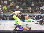 Shane Helms performing a move in the ring.