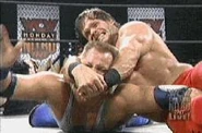Nitro 4-13-98 12.jpg (9 KB) Chris Benoit gets the win with the Crippler Crossface.
