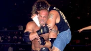 Raven choking Goldberg