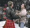 Roddy Piper confronts Bret Hart.