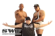 Damien Grundy with Mustafa and Hustler of the "Cold Cash Crew" in the Sacramento Wrestling Federation.