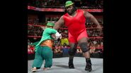 Mark Henry and Hornswoggle do a dance for the WWE Universe.