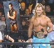 Chris Jericho is wearing Prince Iaukea's skirt and has an easel with a photo of Dean Malenko.