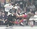 Booker T hitting the Missile Dropkick.