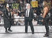 Nitro 4-13-98 11.jpg (10 KB) Sting and Kevin Nash in the ring with James Dillon.